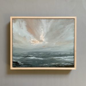 Original seascape oil painting by Tisha Mark, "A Little Light, At Last" 11"x14" oil on cradled gessobord (2024), shown here framed in an unfinished maple frame.