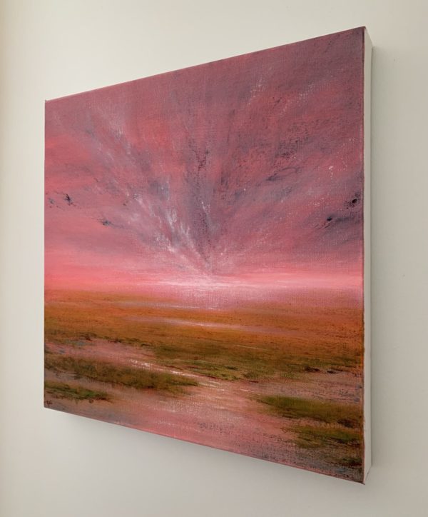Original marsh landscape oil painting by Tisha Mark. "Possibilities" 16"x16" oil on canvas (2023). Painting of a coastal marsh underneath a brilliant pink sunrise or sunset sky. Shown here at an angle from right.